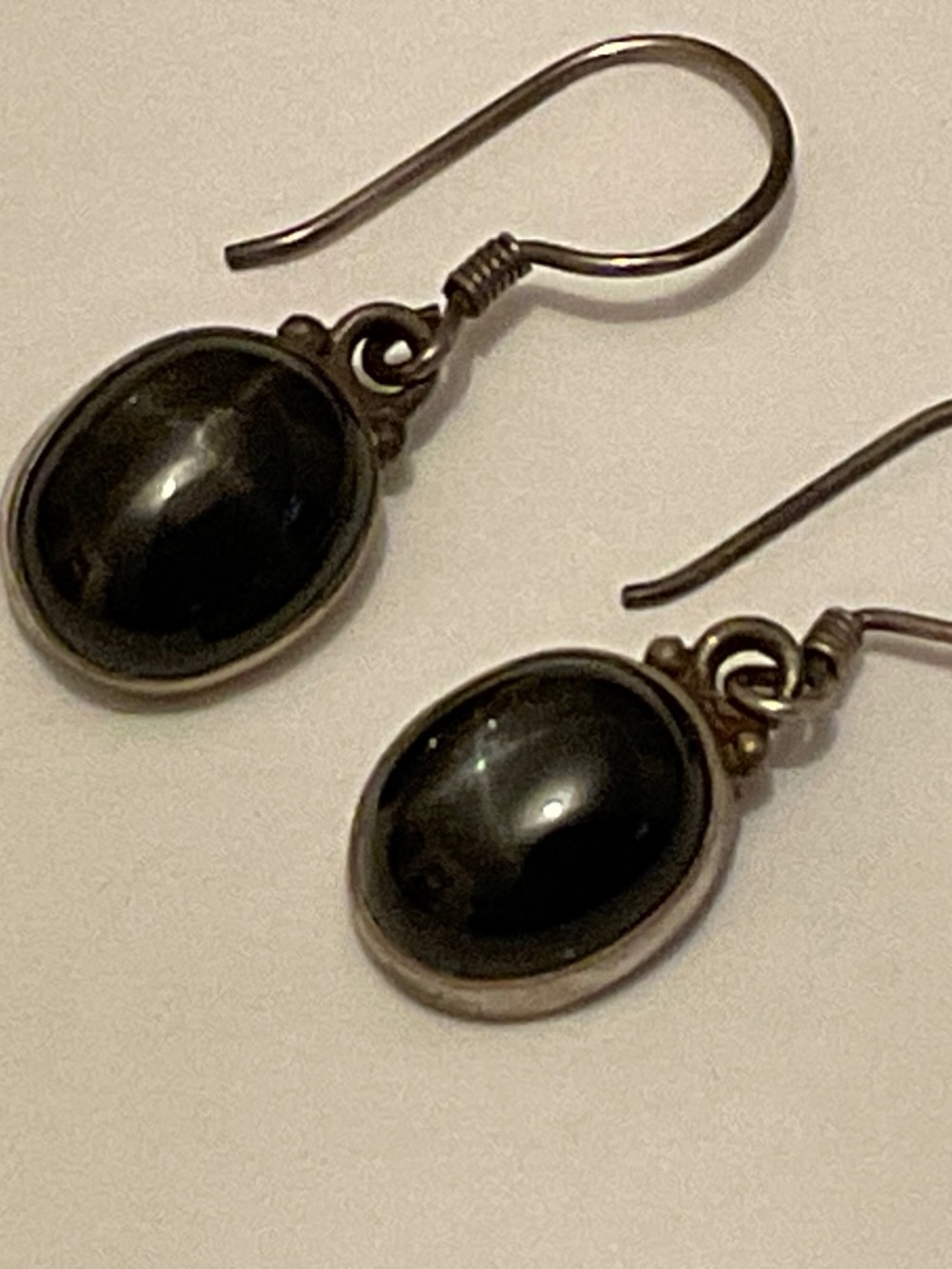 Silver earrings with black stones